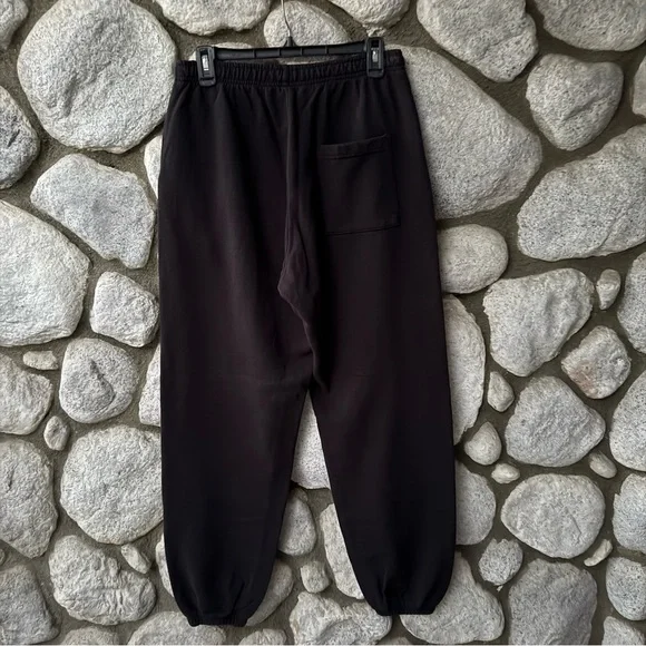 Sporty & Rich Black Wellness Club 1994 Sweatpants